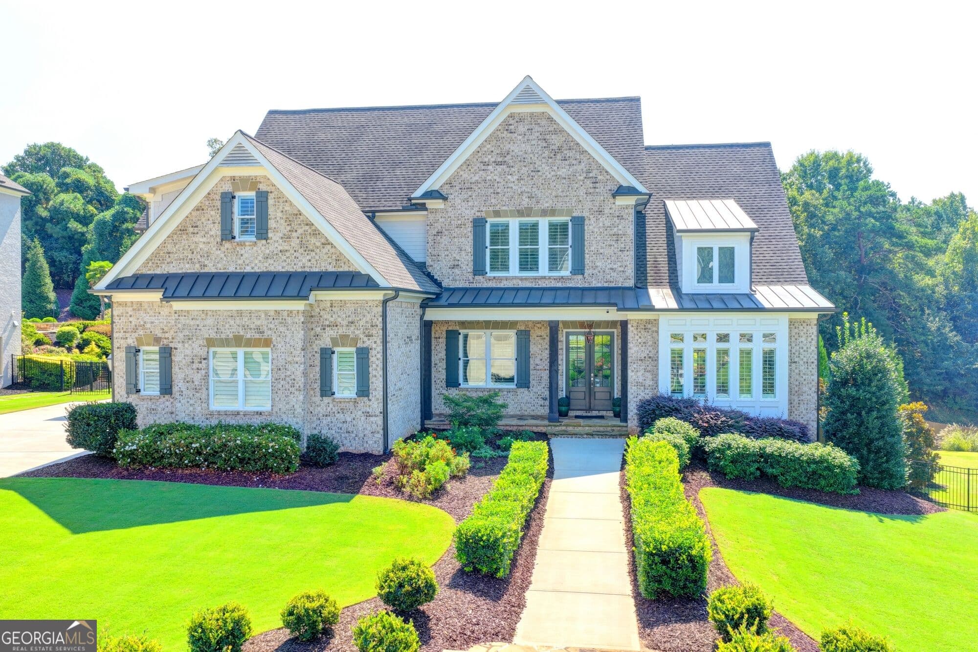 6 bedroom, 5 bathroom, 3,837 sq ft single family residence for sale at 2367 Kesgrove Way, Buford, GA 30518 — photo 2