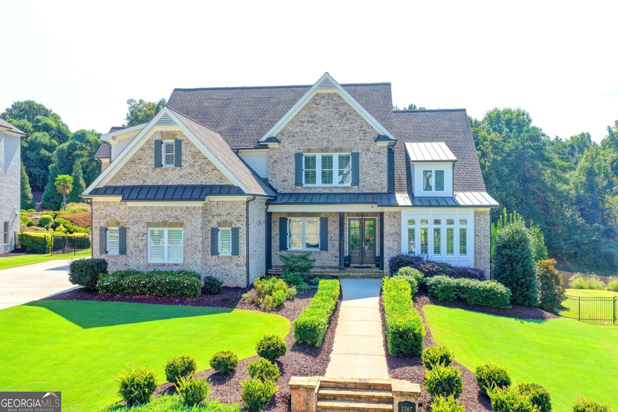 6 bedroom, 5 bathroom, 3,837 sq ft single family residence for sale at 2367 Kesgrove Way, Buford, GA 30518 — photo 3