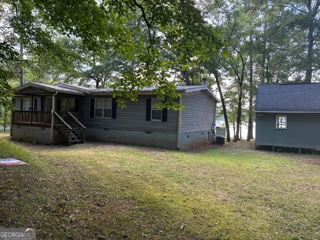 3 bedroom, 2 bathroom, 1,430 sq ft manufactured home,single family residence for sale at 418 Linda Edwards Lane, Sparta, GA 31087 — photo 2