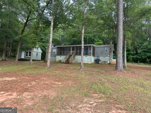 3 bedroom, 2 bathroom, 1,430 sq ft manufactured home,single family residence for sale at 418 Linda Edwards Lane, Sparta, GA 31087 — photo 4