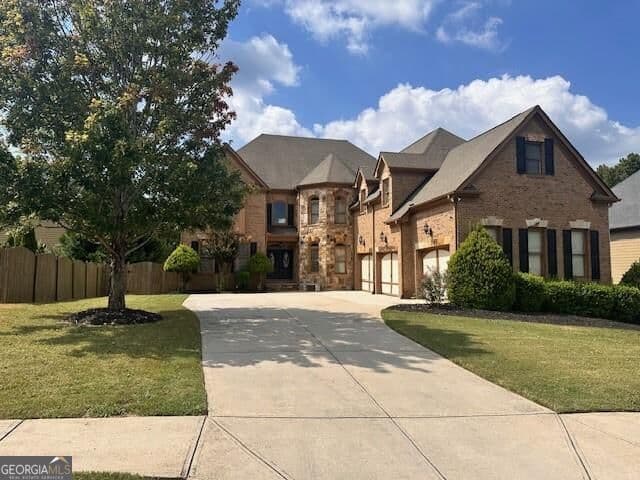 7 bedroom, 5.5 bathroom, 6,509 sq ft single family residence for rent at 4728 Moon Hollow Court, Buford, GA 30519 for $5,500 a month — photo 1 of 19