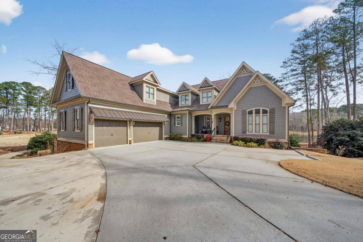 7 bedroom, 6 bathroom, 6,770 sq ft single family residence sold at 1060 Turnberry Circle, Greensboro, GA 30642