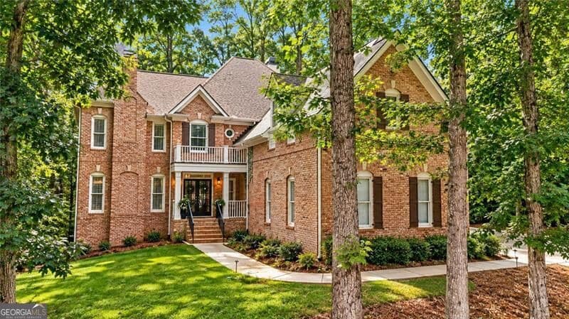 5 bedroom, 4.5 bathroom, 4,393 sq ft single family residence for sale at 3920 Little Falls Drive, Cumming, GA 30041 — photo 1 of 79