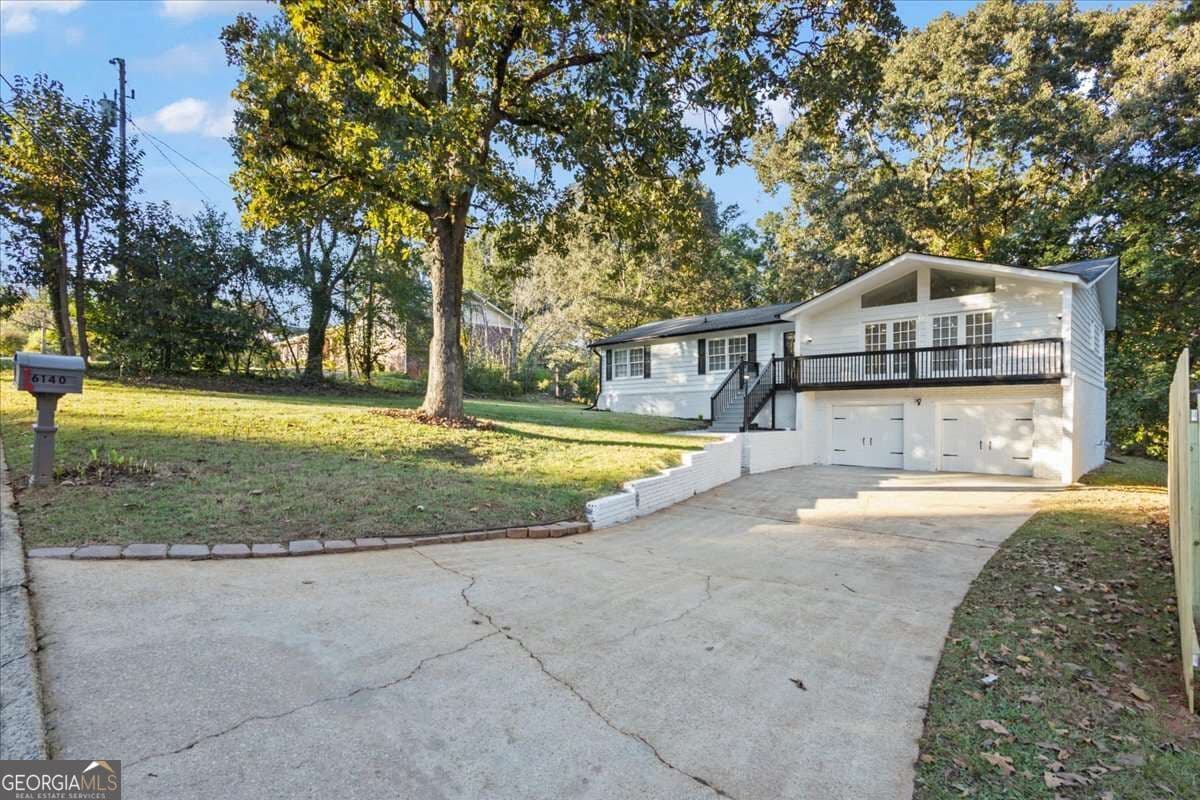 5 bedroom, 3 bathroom, 3,720 sq ft single family residence for sale at 6140 Michelle Lane, Douglasville, GA 30135 — photo 2