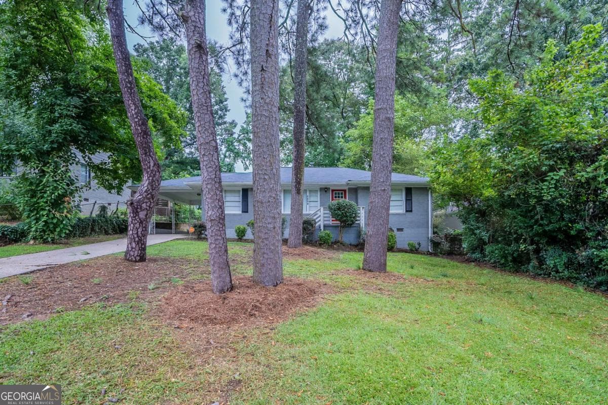 3 bedroom, 1 bathroom, 1,218 sq ft single family residence for sale at 2450 Springdale Road, Atlanta, GA 30315 — photo 1 of 31