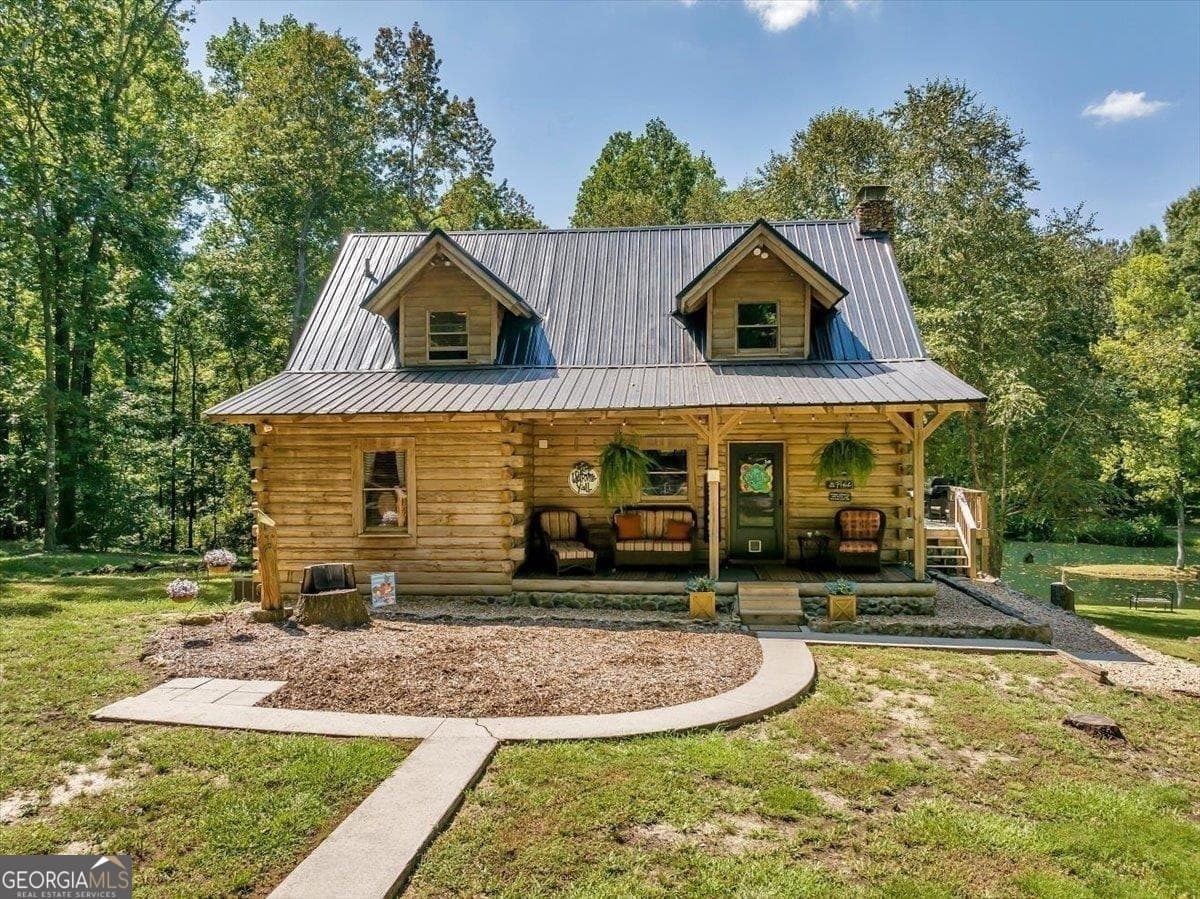 3 bedroom, 1.5 bathroom, 2,532 sq ft cabin,loft,single family residence sold at 560 Ga Hwy 26, Elko, GA 31025