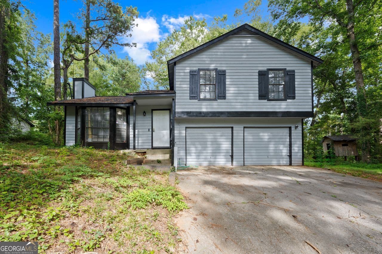 3 bedroom, 2 bathroom, 1,456 sq ft single family residence for sale at 4064 PANOLA WOODS Drive, Stonecrest, GA 30038 — photo 3