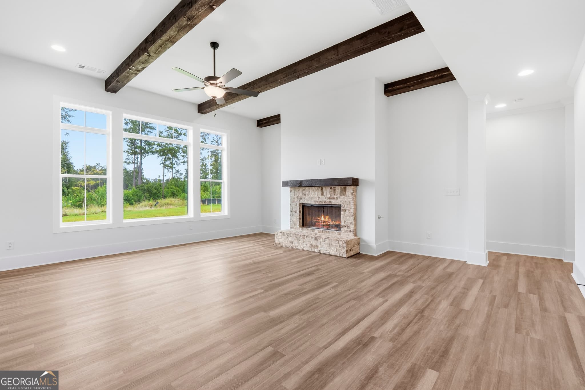 4 bedroom, 4.5 bathroom, 2,911 sq ft single family residence for sale at 155 Hawthorne Lane, Forsyth, GA 31029 — photo 7