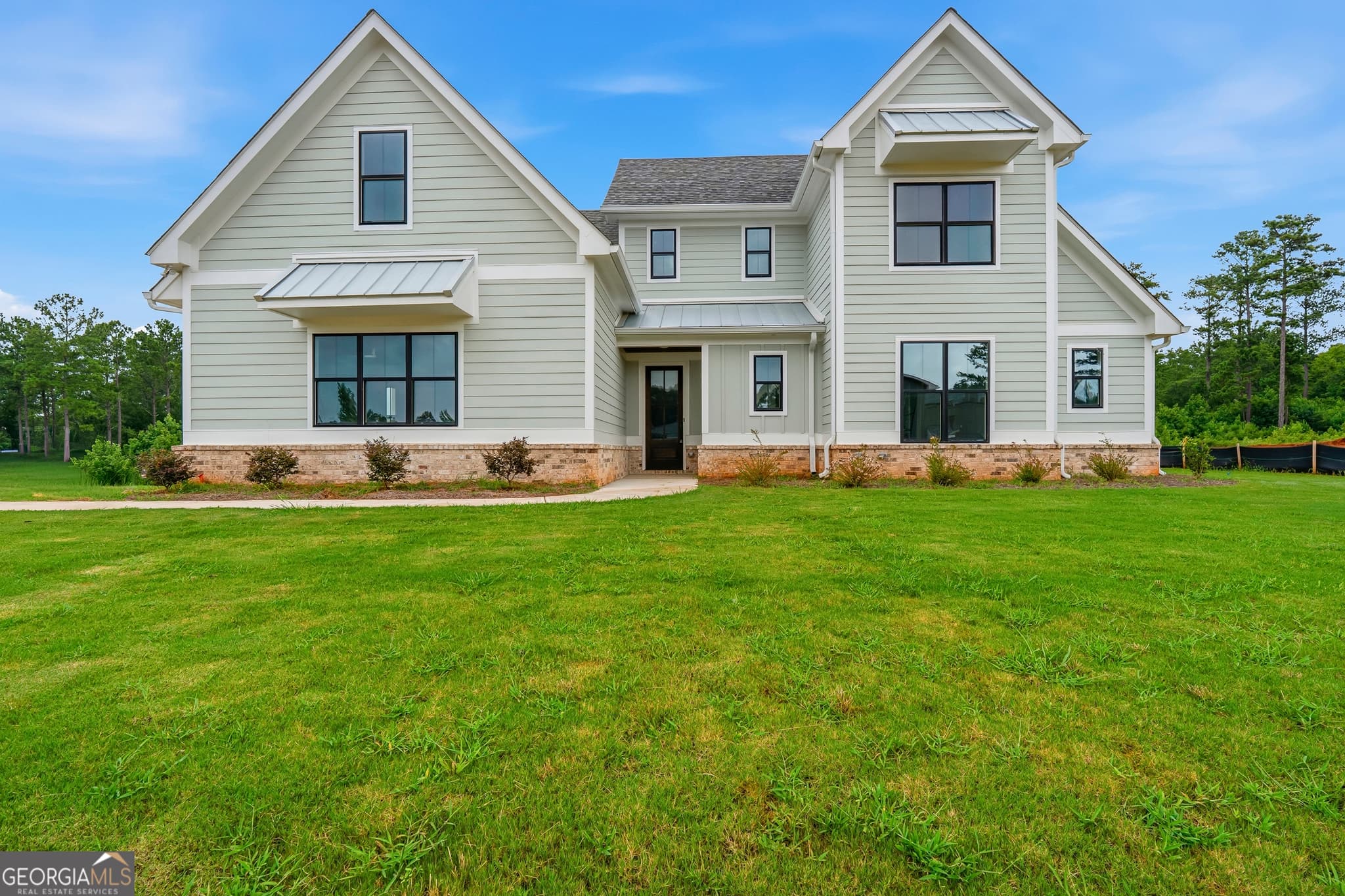 4 bedroom, 4.5 bathroom, 2,911 sq ft single family residence for sale at 155 Hawthorne Lane, Forsyth, GA 31029
