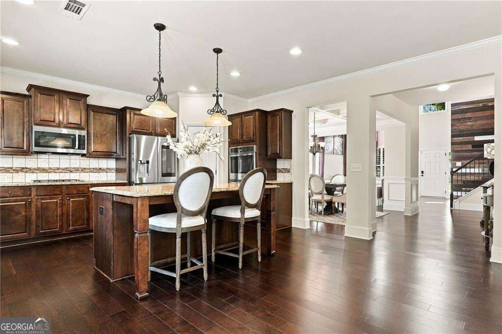 5 bedroom, 4 bathroom, 3,788 sq ft single family residence for sale at 5765 Willow Oak Pass, Cumming, GA 30040 — photo 8