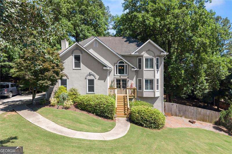 4 bedroom, 2.5 bathroom, 2,238 sq ft single family residence sold at 104 Caracas Drive, Woodstock, GA 30188