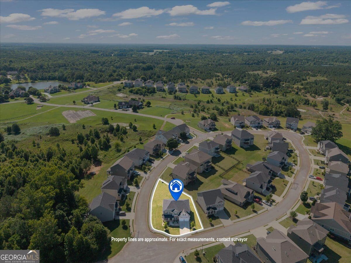 5 bedroom, 3 bathroom, 3,070 sq ft single family residence for sale at 1250 Hawthorne Circle, Madison, GA 30650 — photo 2