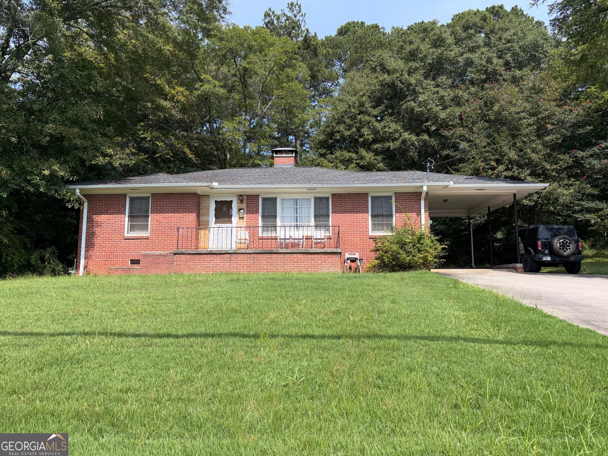 2 bedroom, 1 bathroom, 1,162 sq ft single family residence for sale at 6136 Washington Street, Covington, GA 30014 — photo 1 of 37