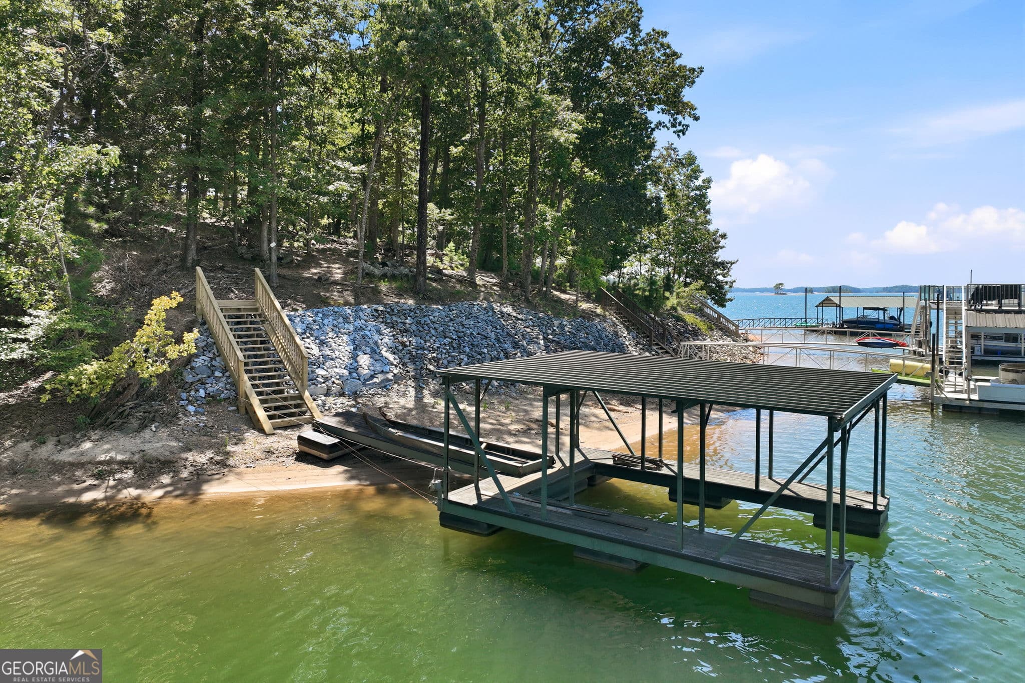 5 bedroom, 4.5 bathroom, 3,682 sq ft single family residence for sale at 5359 Point South Drive, Gainesville, GA 30504 — photo 4