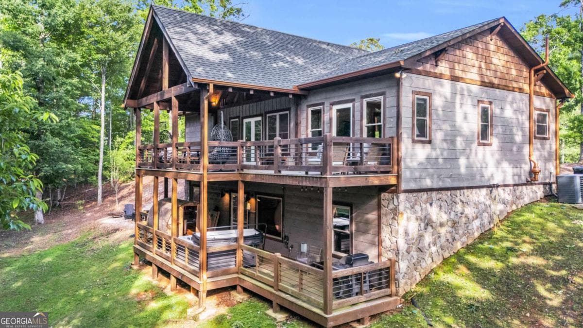 4 bedroom, 3 bathroom, 2,688 sq ft cabin,single family residence for sale at 566 High Meadows Drive, Morganton, GA 30560 — photo 2