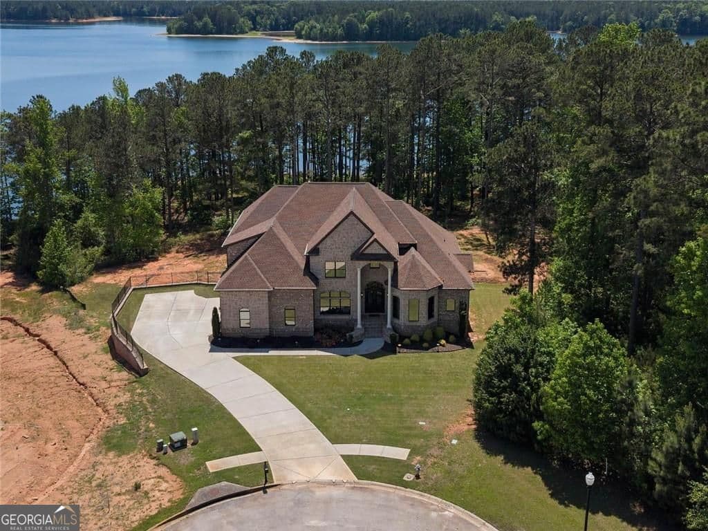 8 bedroom, 8 bathroom, 7,239 sq ft single family residence for sale at 1804 Lake Pointe Circle, Locust Grove, GA 30248