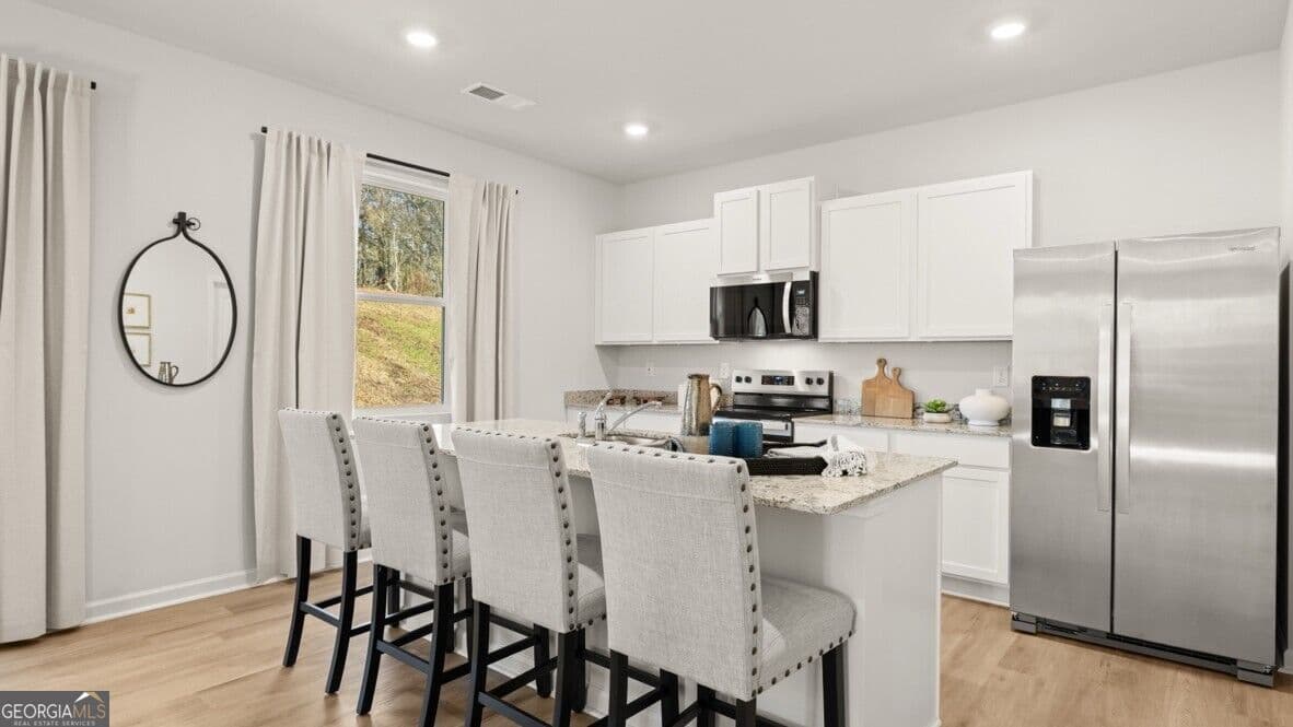 4 bedroom, 2.5 bathroom, 2,340 sq ft single family residence for sale at 2974 Daxton Lane, Gainesville, GA 30507 — photo 5