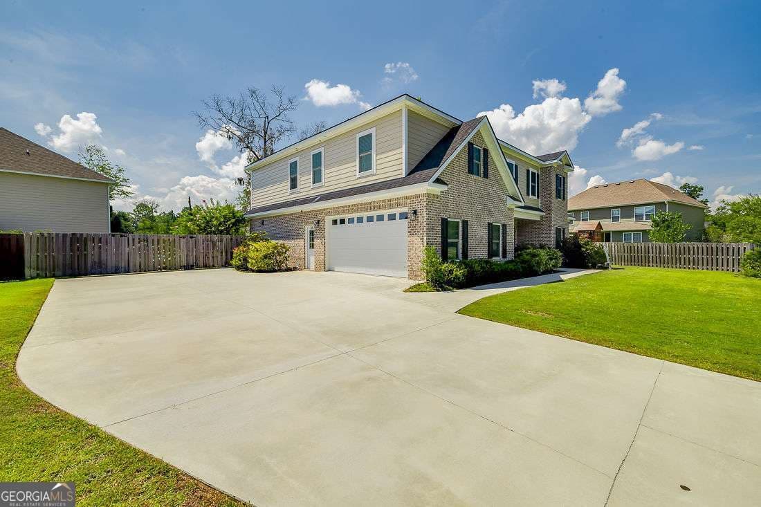 6 bedroom, 4 bathroom, 4,002 sq ft single family residence for sale at 306 Polly Branch Drive, Rincon, GA 31326 — photo 4