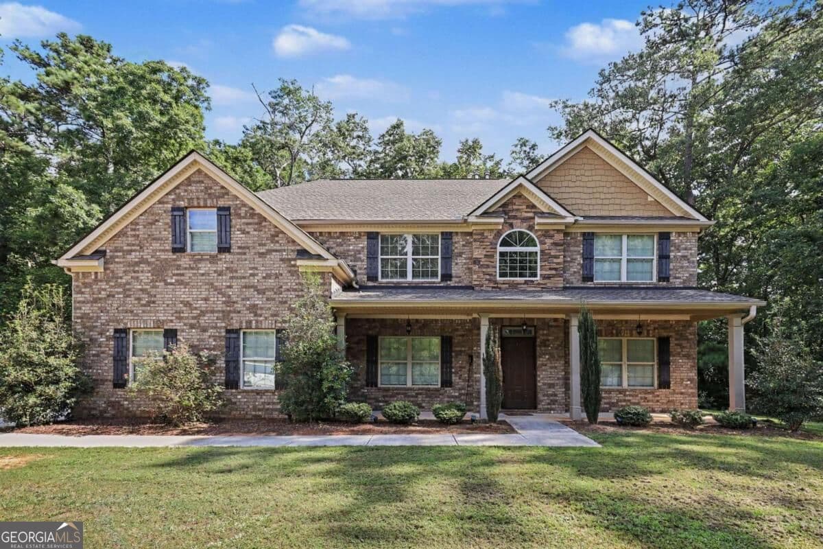4 bedroom, 3 bathroom, 3,140 sq ft single family residence for sale at 855 Archie Drive, Mcdonough, GA 30252 — photo 1 of 38