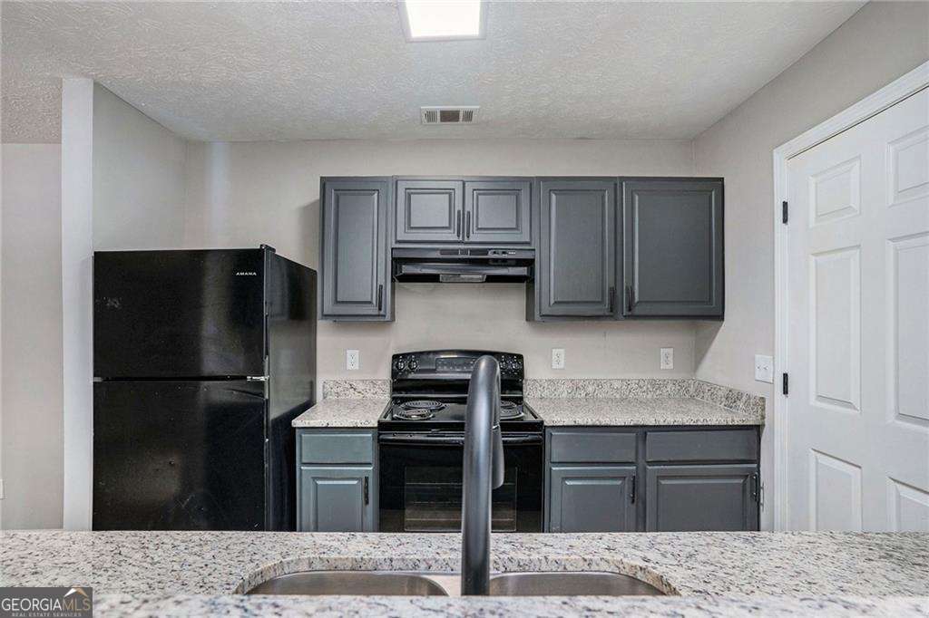 3 bedroom, 2 bathroom, 1,202 sq ft condominium for rent at 2102 Par Three Way, Lithonia, GA 30038 for $1,500 a month — photo 5