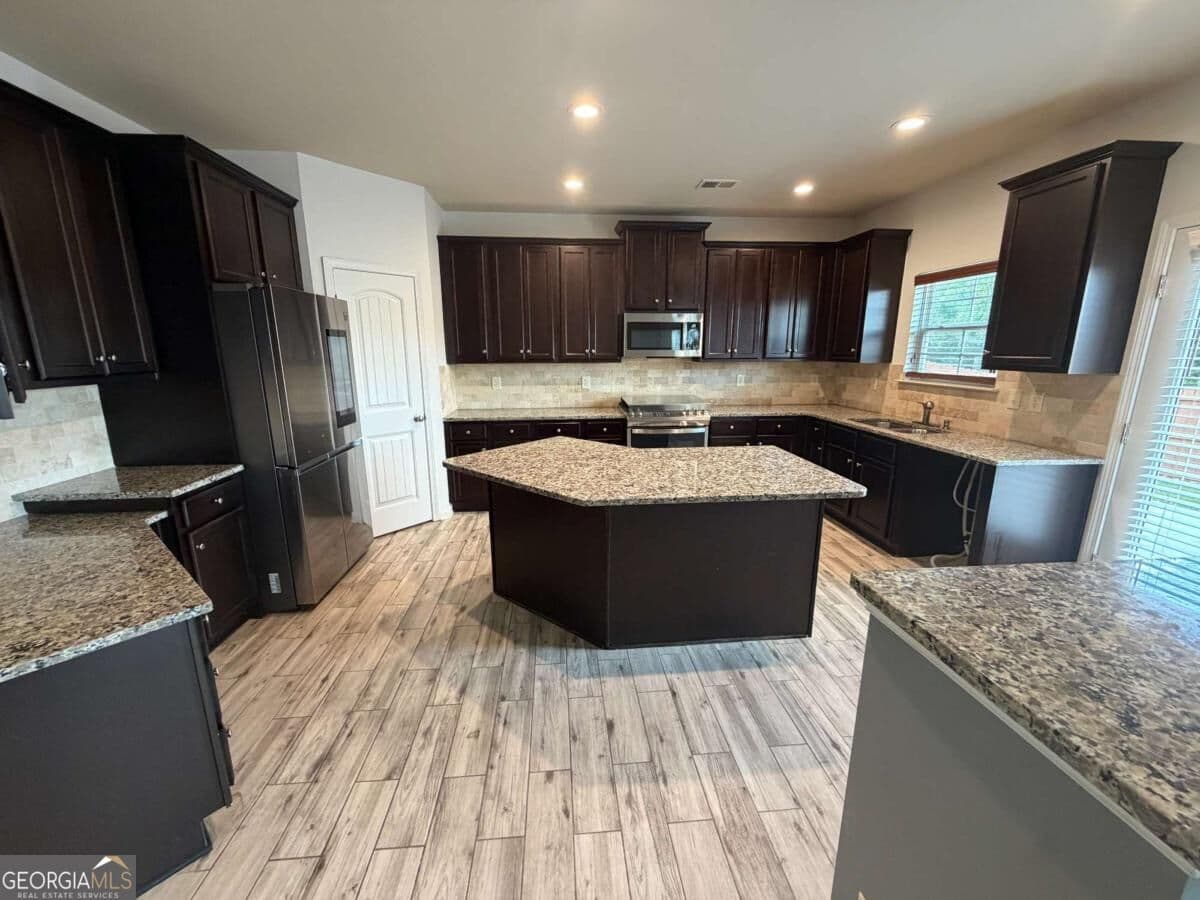 4 bedroom, 2.5 bathroom single family residence for rent at 1162 Creek Top Road, Loganville, GA 30052 for $2,450 a month — photo 6