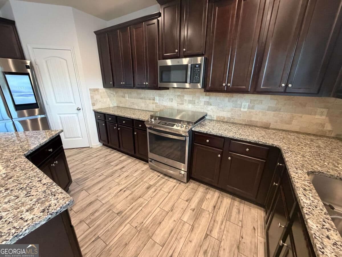 4 bedroom, 2.5 bathroom single family residence for rent at 1162 Creek Top Road, Loganville, GA 30052 for $2,450 a month — photo 8