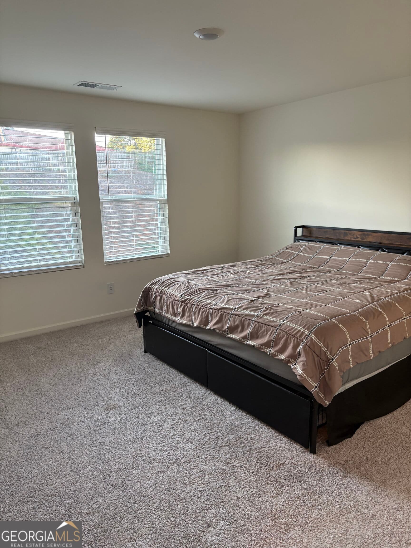 4 bedroom, 2.5 bathroom single family residence for sale at 7047 Rochford Drive, Covington, GA 30014 — photo 5