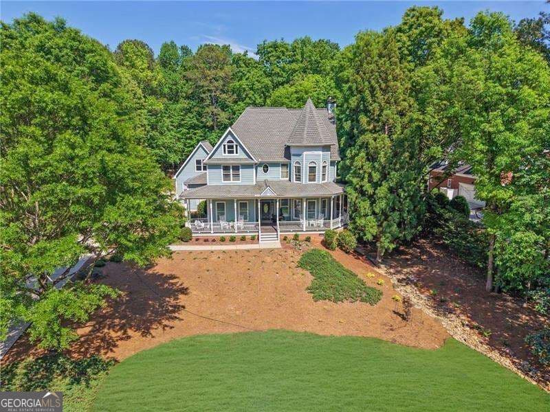 4 bedroom, 3.5 bathroom, 4,100 sq ft single family residence for sale at 360 Coach House Lane, Milton, GA 30004 — photo 4