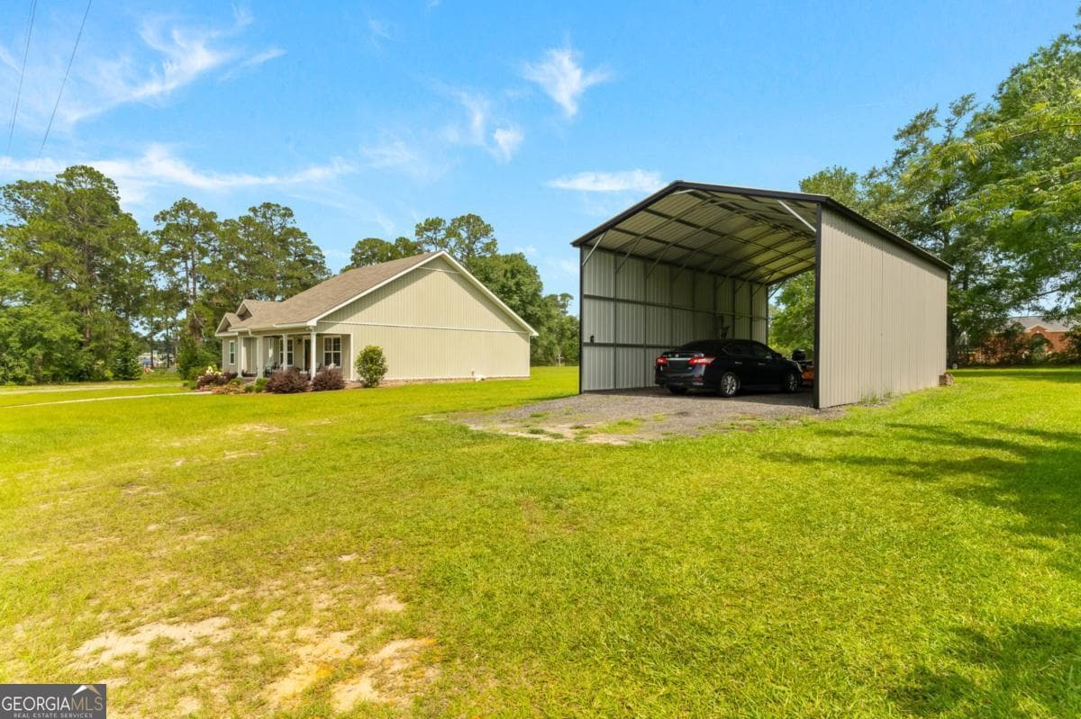 3 bedroom, 2 bathroom, 1,686 sq ft single family residence for sale at 334 W Pine Street, Metter, GA 30439 — photo 3