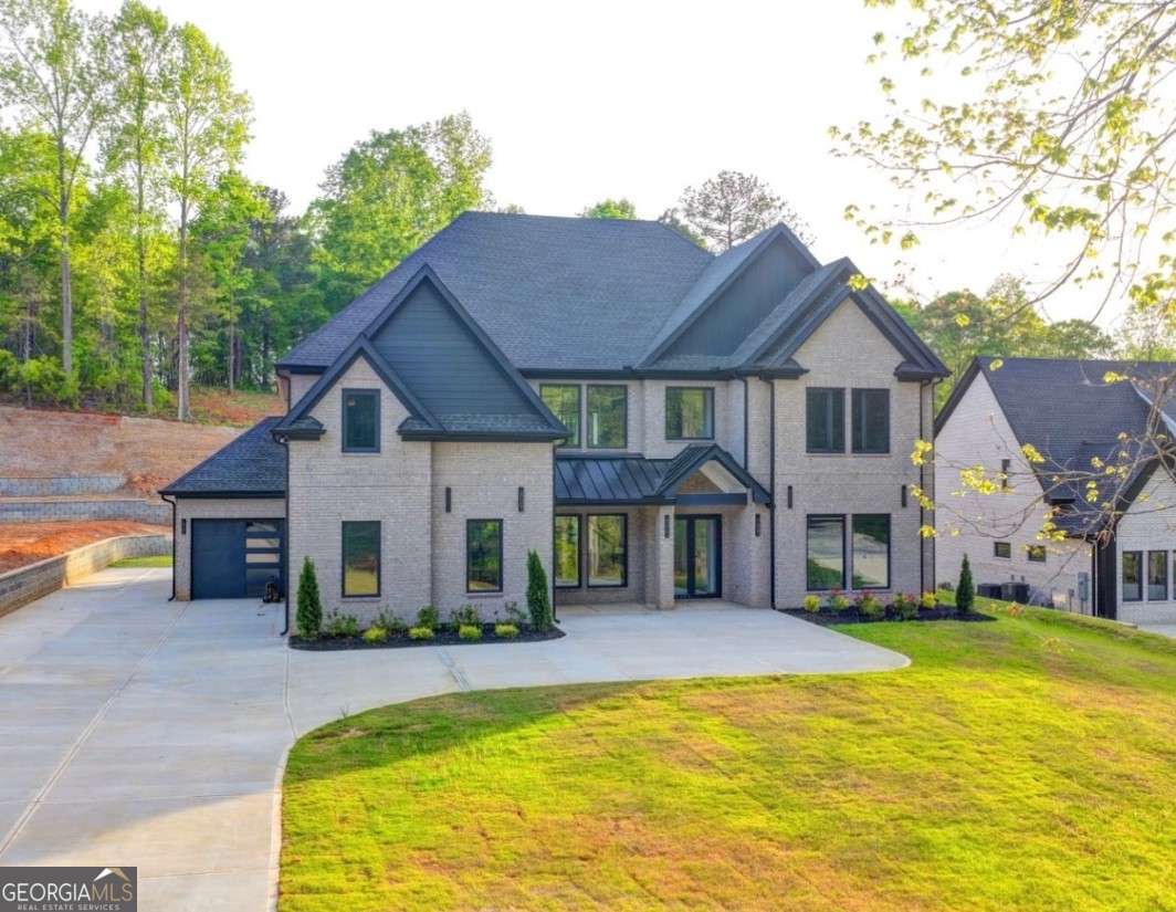 5 bedroom, 4.5 bathroom, 4,600 sq ft single family residence for sale at 5274 Cash Road, Flowery Branch, GA 30542