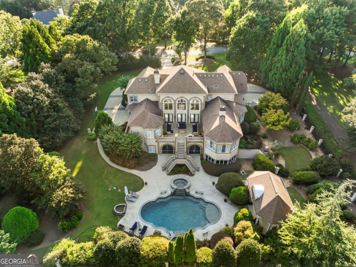 5 bedroom, 5.5 bathroom, 8,805 sq ft single family residence for sale at 1905 Kathy Whitworth Drive, Braselton, GA 30517 — photo 2