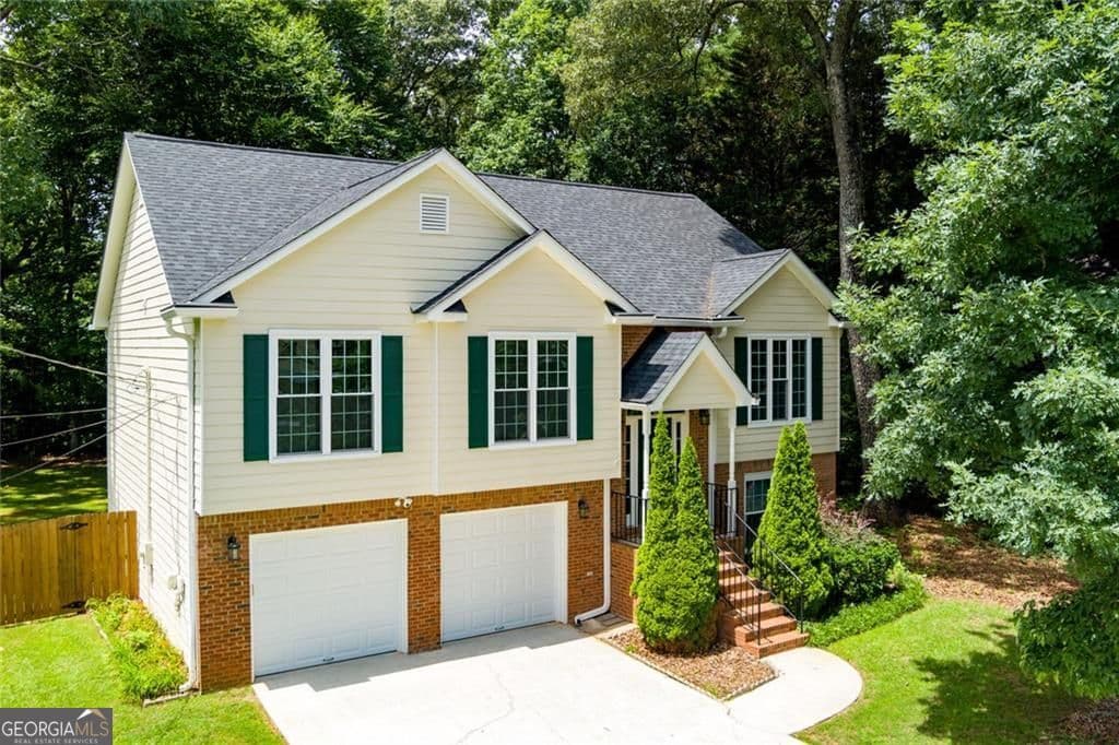 4 bedroom, 3 bathroom, 2,127 sq ft single family residence sold at 2450 Whitehead Place Drive, Suwanee, GA 30024