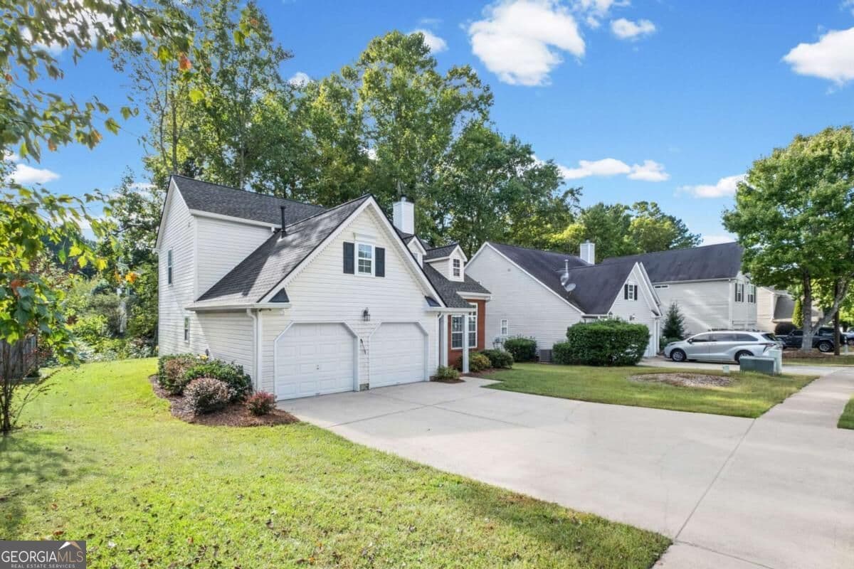 3 bedroom, 2 bathroom, 1,688 sq ft single family residence for sale at 131 Weatherstone Drive, Woodstock, GA 30188 — photo 2