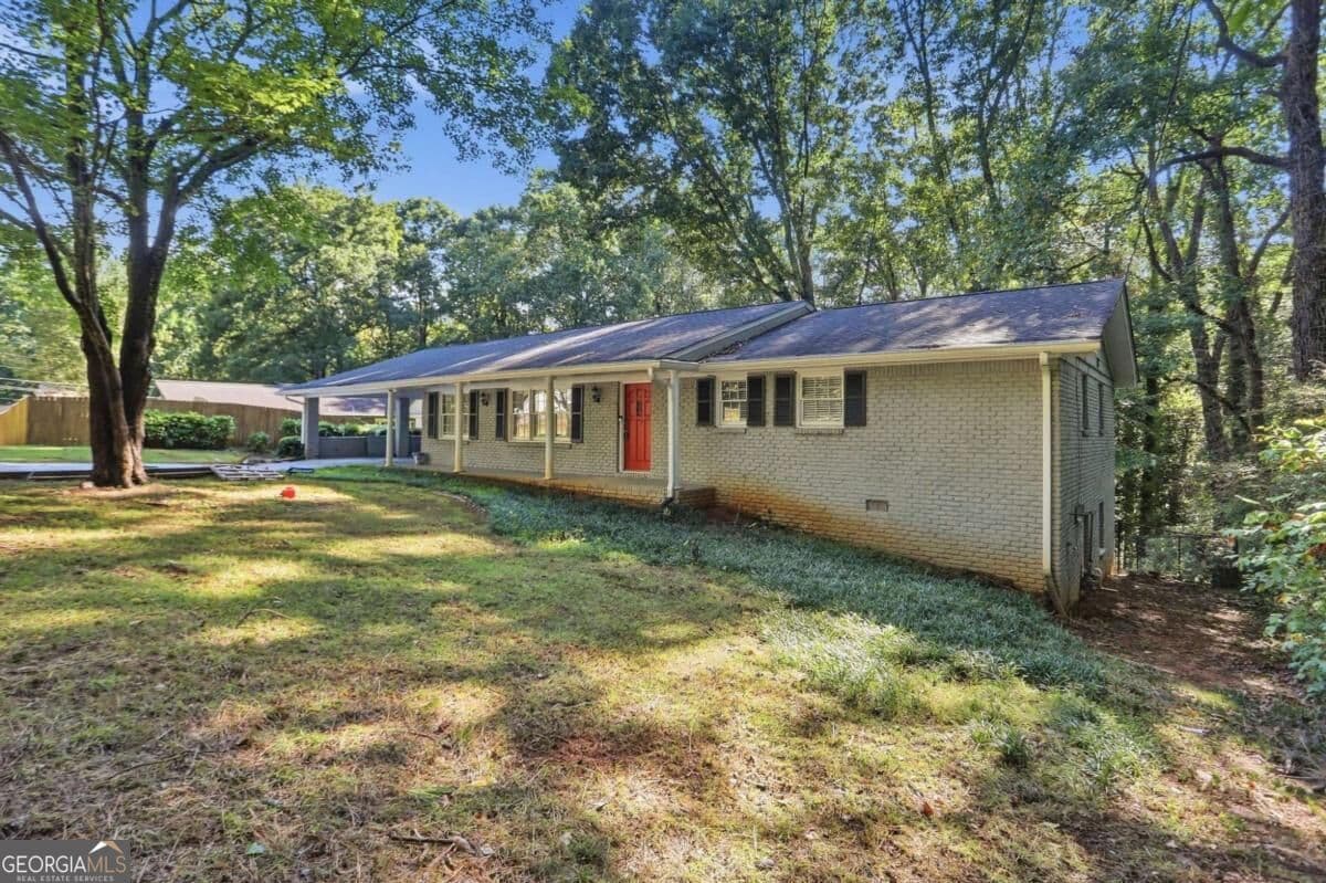3 bedroom, 3 bathroom, 3,026 sq ft single family residence for sale at 5528 Fern Creek Drive, Lilburn, GA 30047 — photo 3