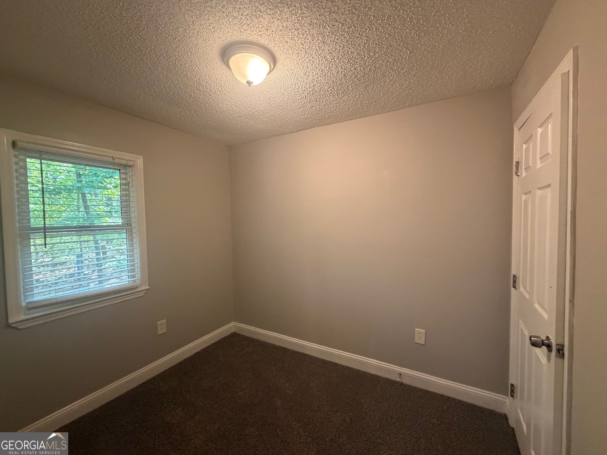4 bedroom, 2 bathroom, 2,202 sq ft single family residence for sale at 8208 Connally Drive, Douglasville, GA 30134 — photo 6
