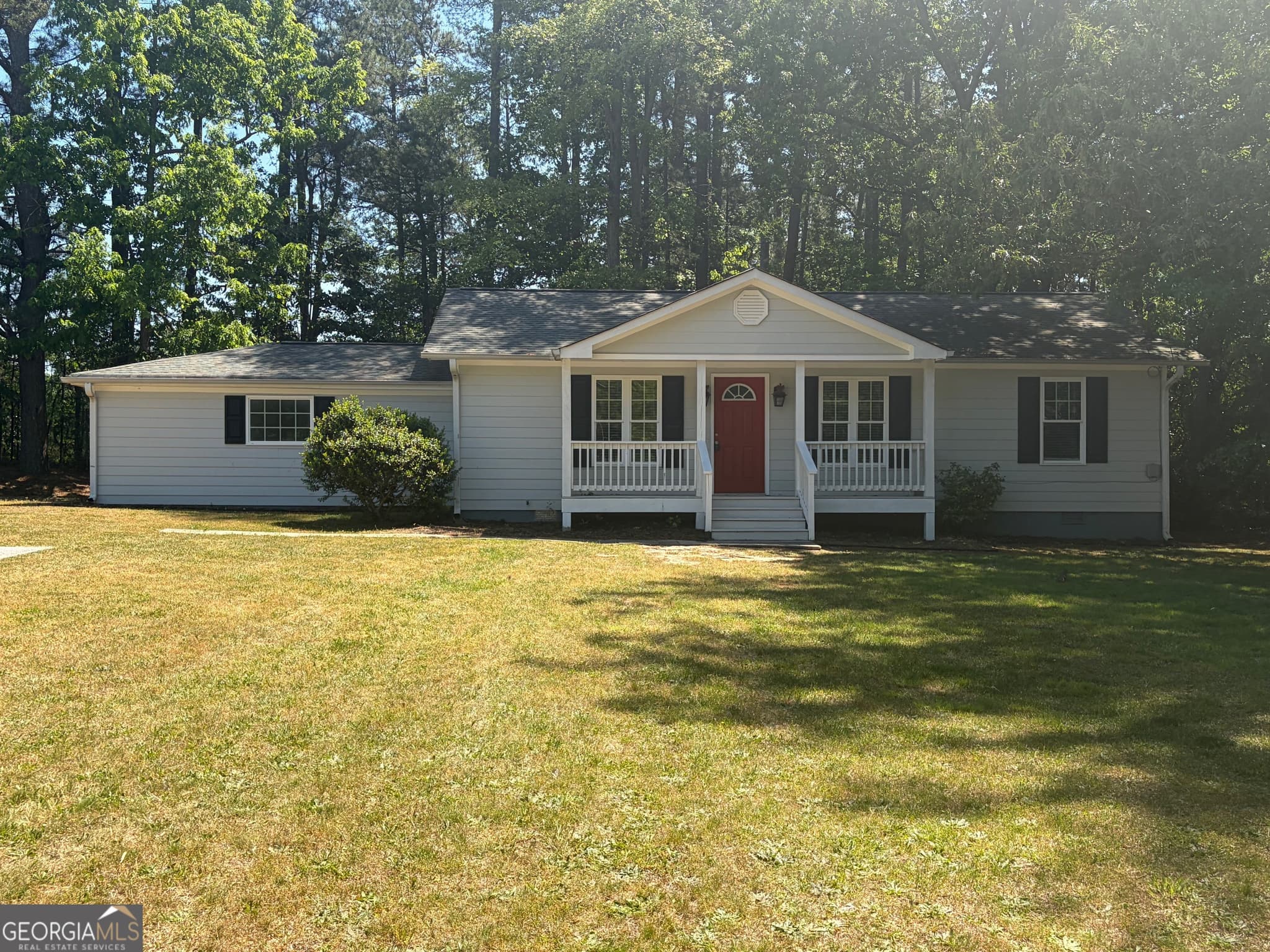 4 bedroom, 2 bathroom, 2,202 sq ft single family residence for sale at 8208 Connally Drive, Douglasville, GA 30134 — photo 1 of 12