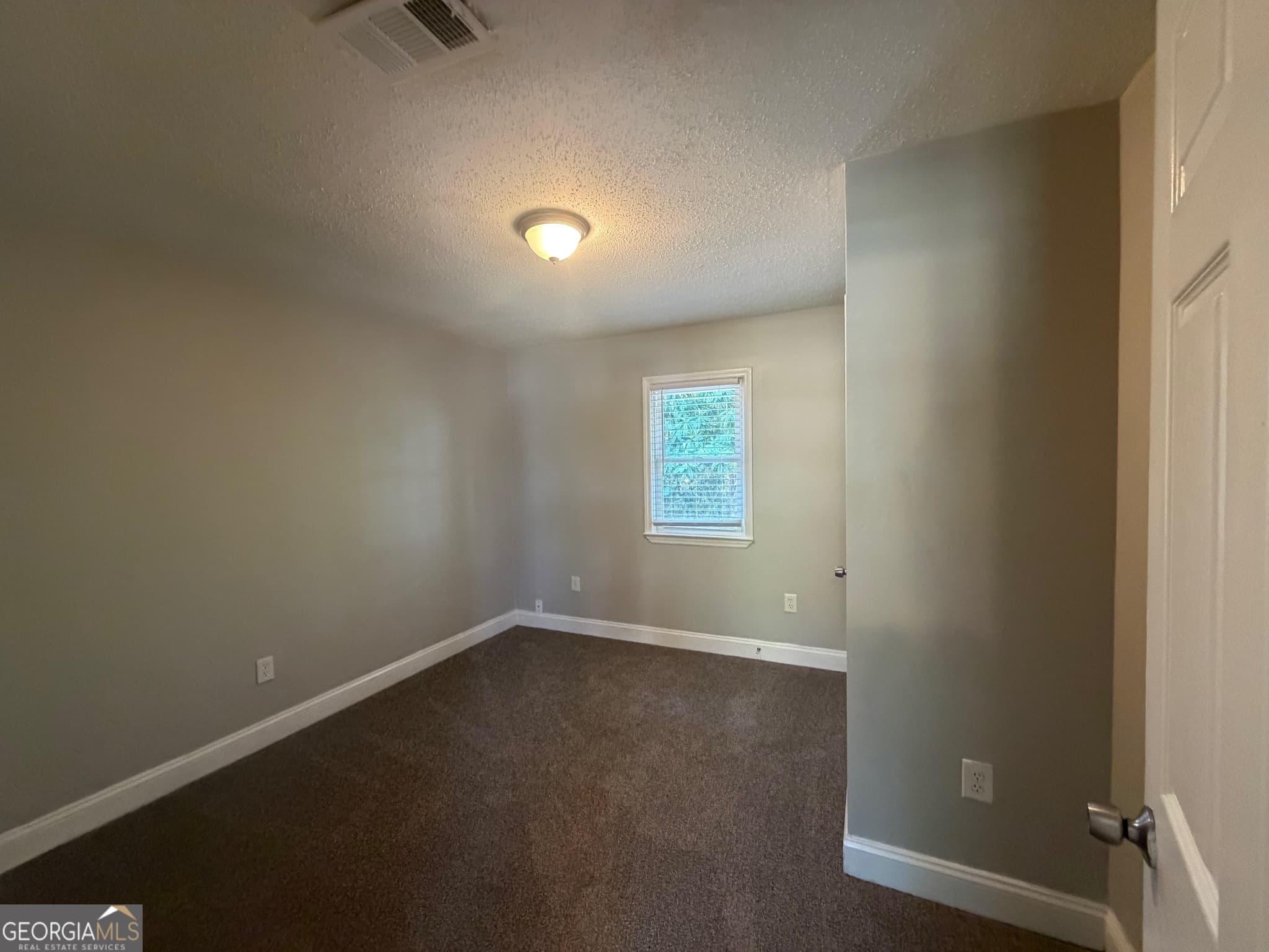 4 bedroom, 2 bathroom, 2,202 sq ft single family residence for sale at 8208 Connally Drive, Douglasville, GA 30134 — photo 9