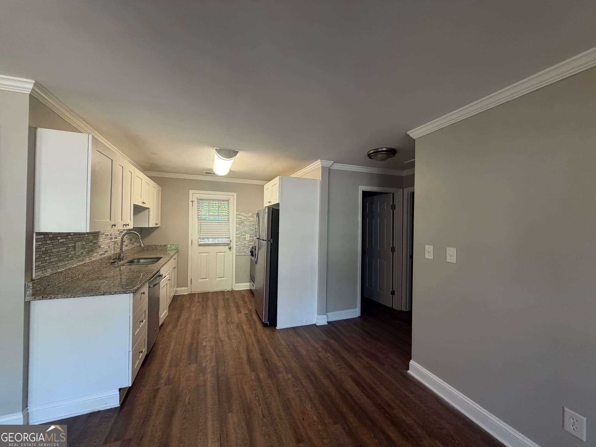 4 bedroom, 2 bathroom, 2,202 sq ft single family residence for sale at 8208 Connally Drive, Douglasville, GA 30134 — photo 4