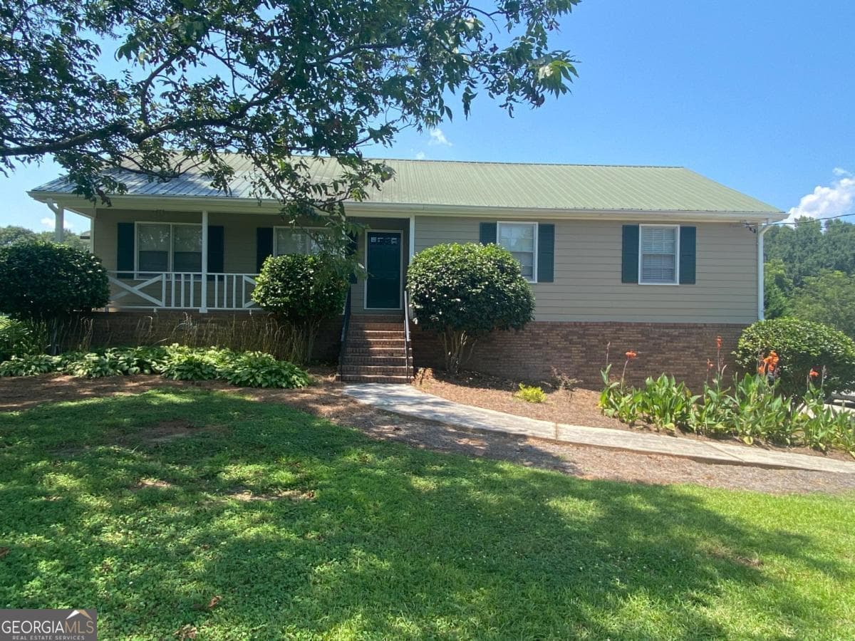 4 bedroom, 3 bathroom, 3,756 sq ft single family residence for rent at 420 Atlanta Highway, Loganville, GA 30052 for $2,400 a month — photo 1 of 10