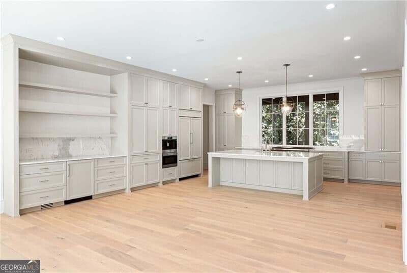 7 bedroom, 7.5 bathroom, 7,697 sq ft single family residence for sale at 1353 W Wesley Road, Atlanta, GA 30327 — photo 5