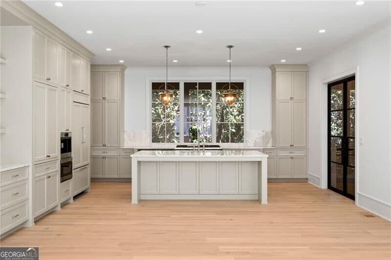7 bedroom, 7.5 bathroom, 7,697 sq ft single family residence for sale at 1353 W Wesley Road, Atlanta, GA 30327 — photo 4