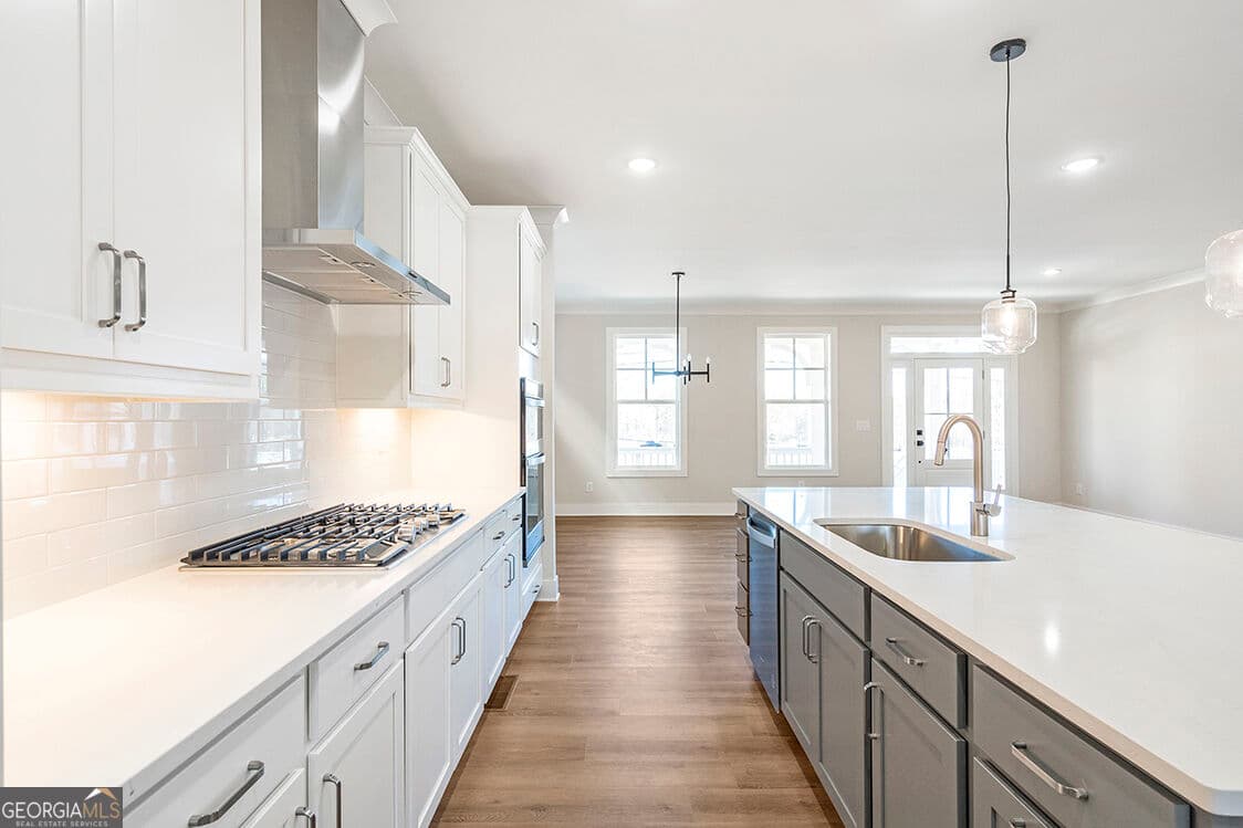4 bedroom, 3.5 bathroom, 2,660 sq ft single family residence for sale at 152 Palm Street, Holly Springs, GA 30115 — photo 10