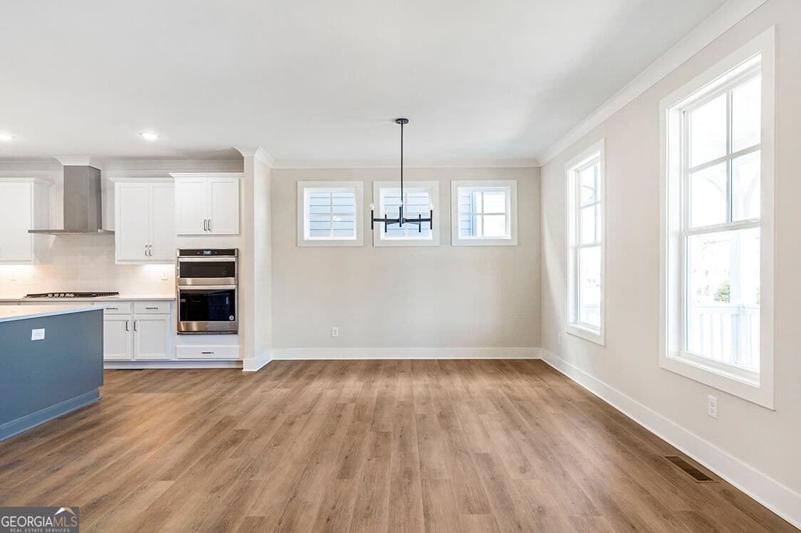 4 bedroom, 3.5 bathroom, 2,660 sq ft single family residence for sale at 152 Palm Street, Holly Springs, GA 30115 — photo 8