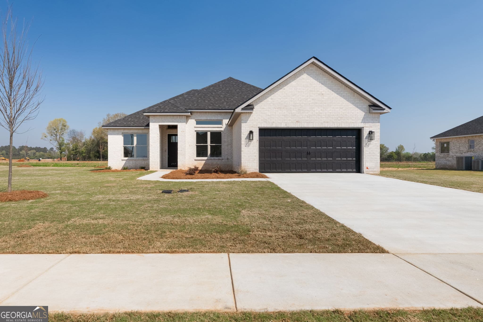 3 bedroom, 2 bathroom, 2,003 sq ft single family residence for sale at 207 Farmland Circle, Perry, GA 31069 — photo 2