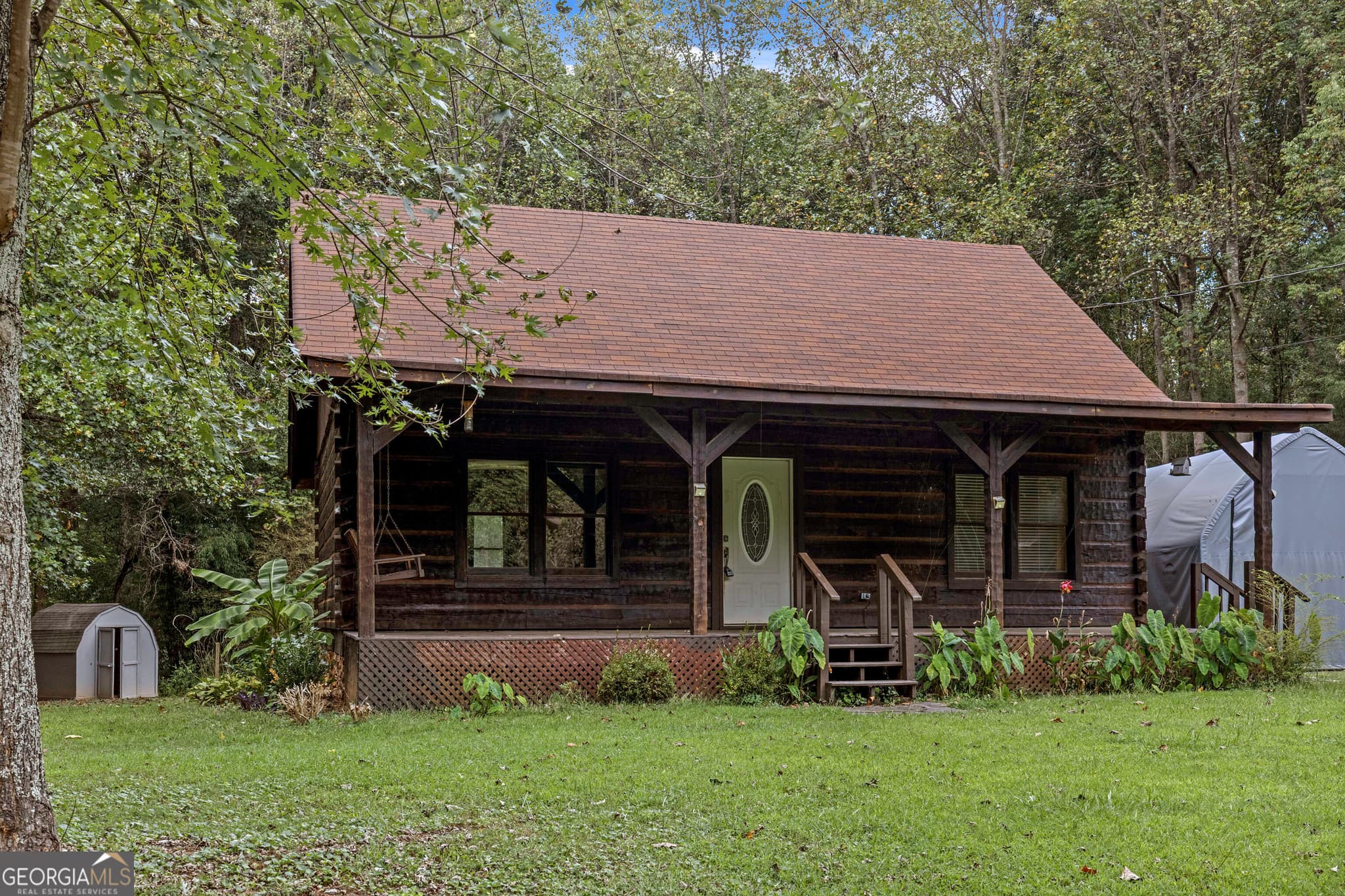 3 bedroom, 2 bathroom, 1,224 sq ft cabin,single family residence for sale at 91 Oak Hill Drive, White, GA 30184 — photo 1 of 40