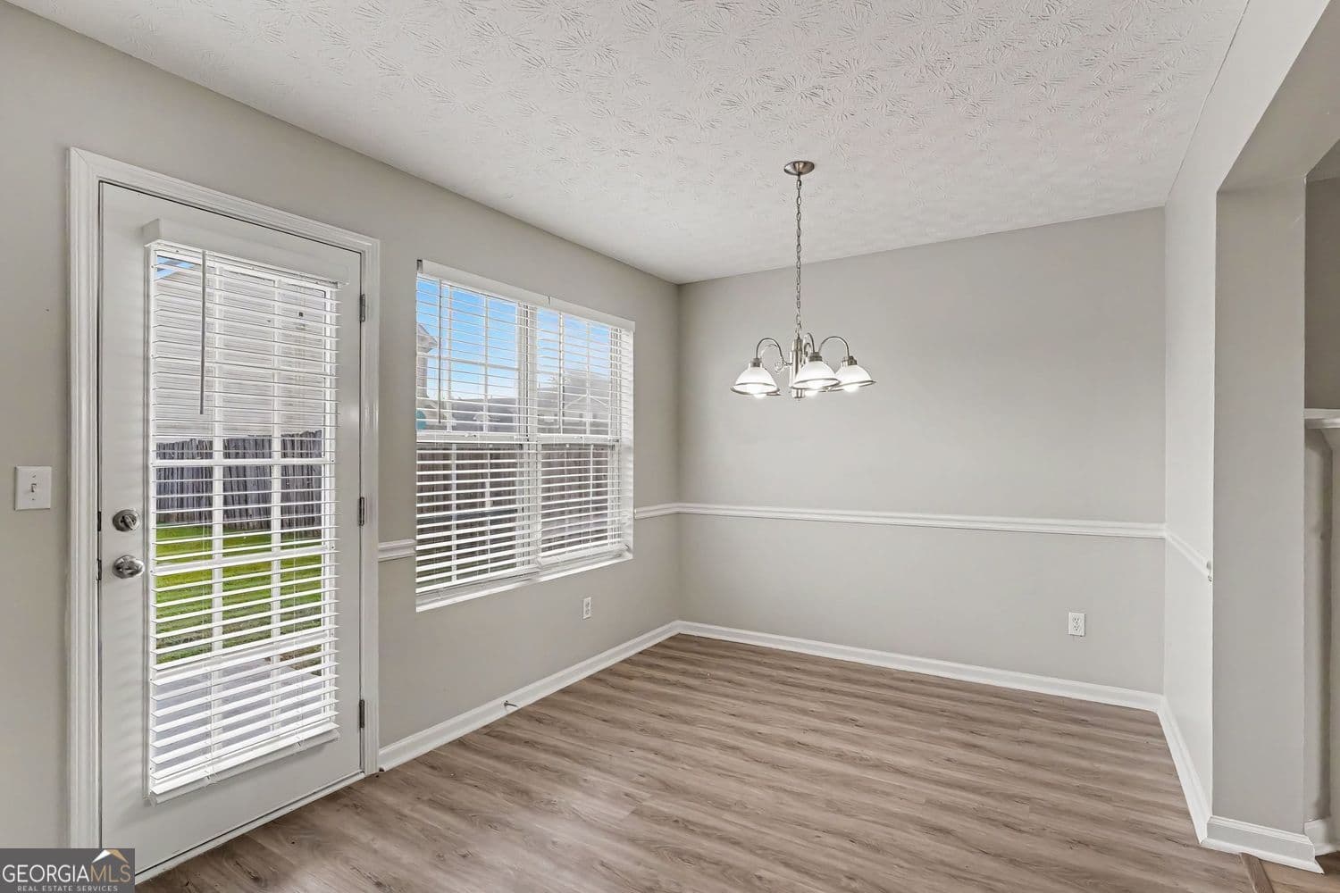 3 bedroom, 2.5 bathroom, 1,302 sq ft single family residence for sale at 3055 Tussahaw Crossing, Mcdonough, GA 30252 — photo 6