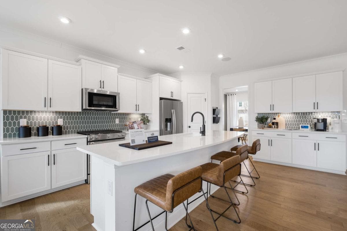 5 bedroom, 3 bathroom, 2,956 sq ft single family residence for sale at 6090 Marigold Way, Atlanta, GA 30349 — photo 9