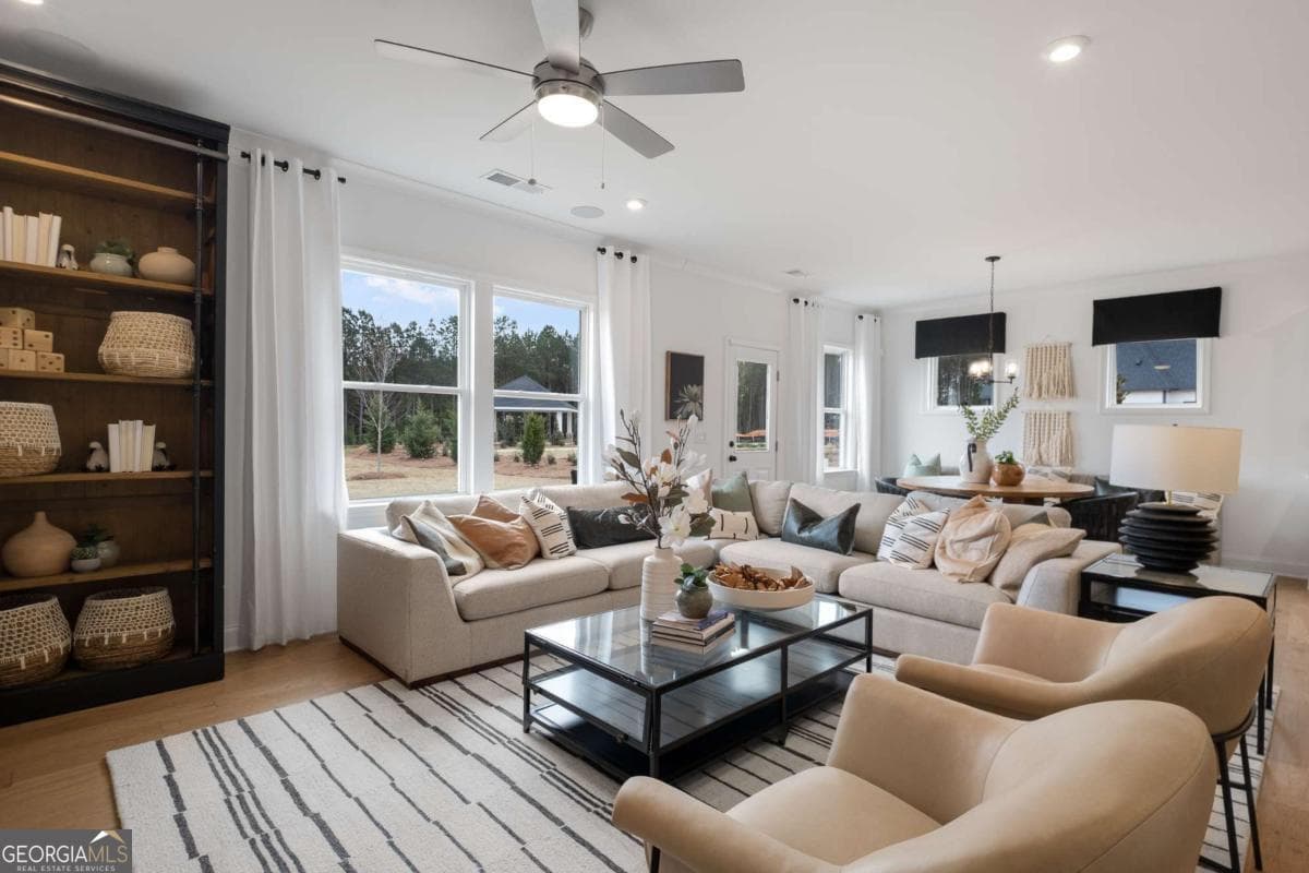 5 bedroom, 3 bathroom, 2,956 sq ft single family residence for sale at 6090 Marigold Way, Atlanta, GA 30349 — photo 4