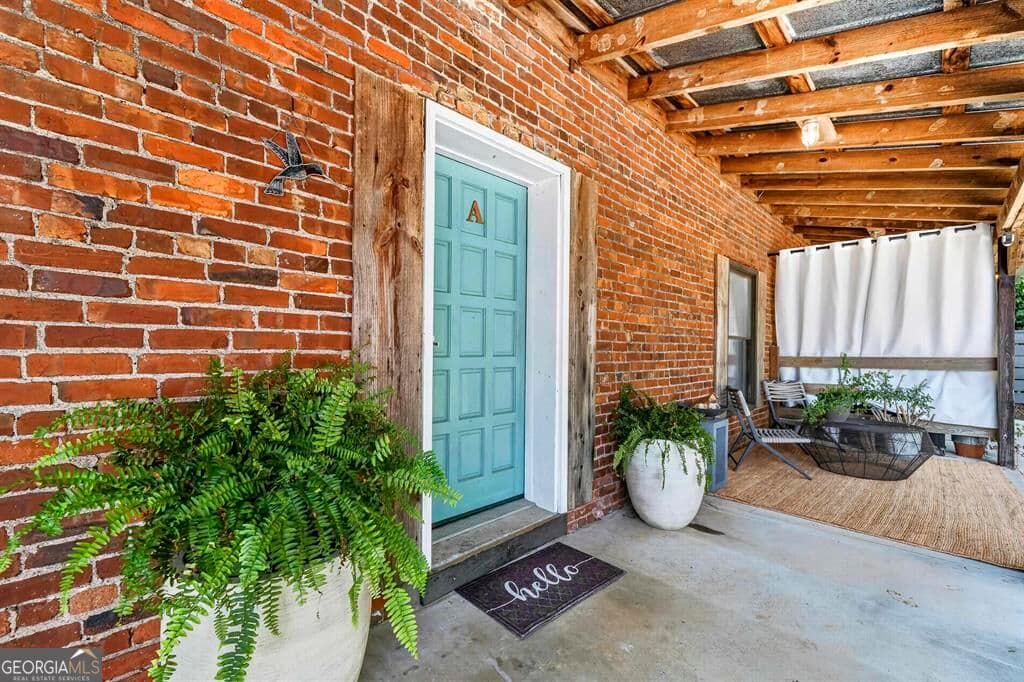 4 bedroom, 3.5 bathroom, 2,768 sq ft single family residence for sale at 105 West Harris Street, Eatonton, GA 31024 — photo 4