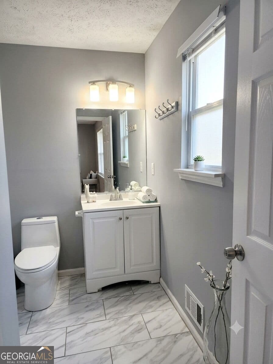 4 bedroom, 2 bathroom, 1,607 sq ft single family residence for sale at 4415 Pacer Court, Stone Mountain, GA 30083 — photo 7